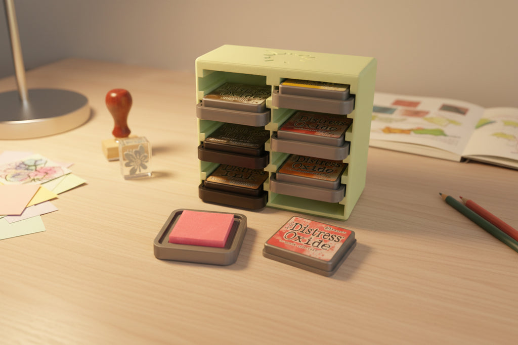 Set of ink pads in a white container with visible brand names.